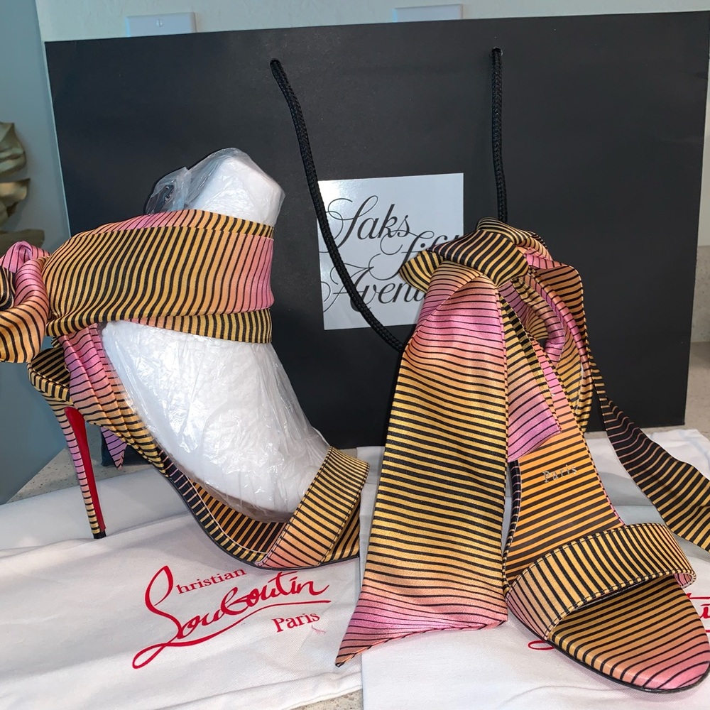 Christian sandal 100 new worn once sold out in most sizes, very comfortable